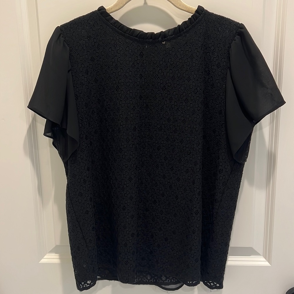 LOFT black appliqué top with high collar and flowy sleeves, size S